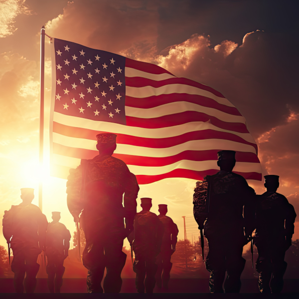 Soldiers with american flag at sunset